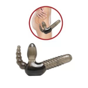 Rakmeteta strap-on anaalstimulaatoriga.